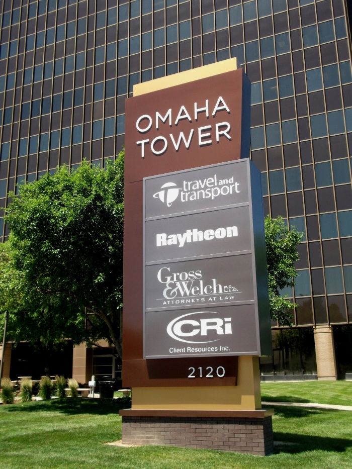 Illuminated, double-face Omaha Tower monument sign